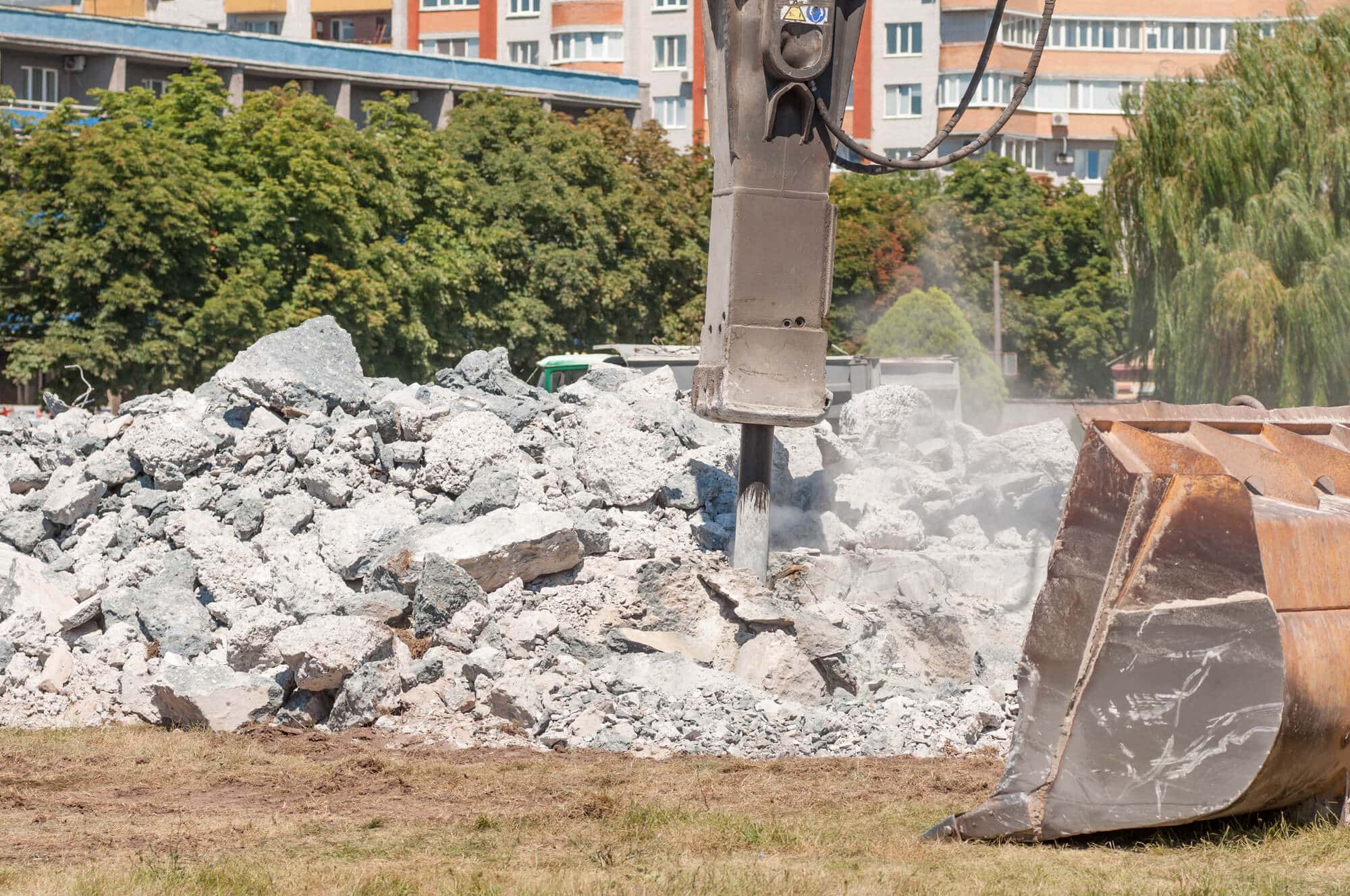 Concrete demolition services removing a large concrete structure
