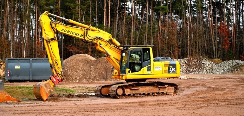 Excavator performing land clearing in New Orleans, Louisiana - TurnKey Demo Team