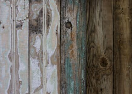 Reclaimed wood planks salvaged through deconstruction