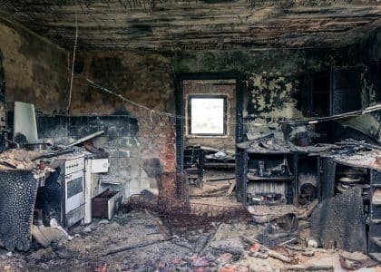 Fire-damaged house awaiting demolition in New Orleans